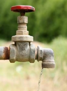 leaky outdoor faucet wastes water and money